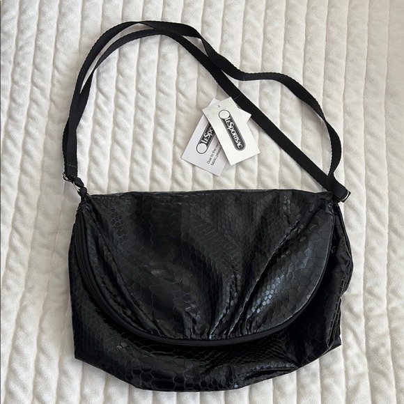 Lesportsac Handbags - NWT Lesportsac Black Crossbody Shoulder Bag with Snakeskin Textured Fabric